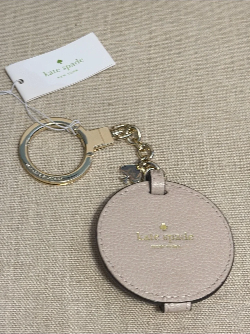 kate spade Blush Pink Pebbled Leather Round Mirror/Key Chain